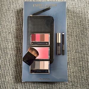 Estée Lauder travel size make up and clutch, never opened
